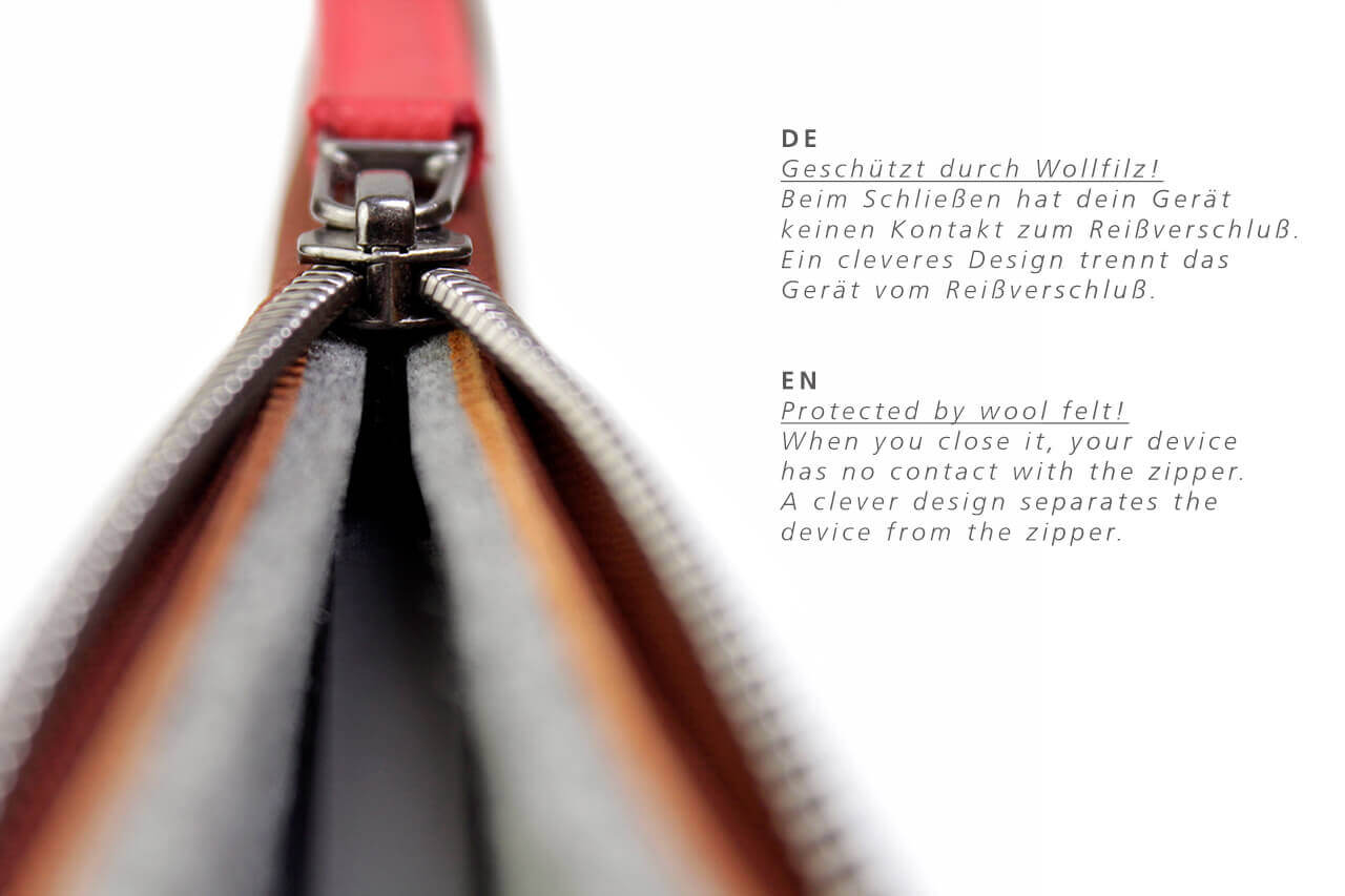 Microsoft Surface Pro Hülle ANGUS aus Leder mit YKK-Reißverschluss, geschützt durch Wollfilz, in rot und grau.