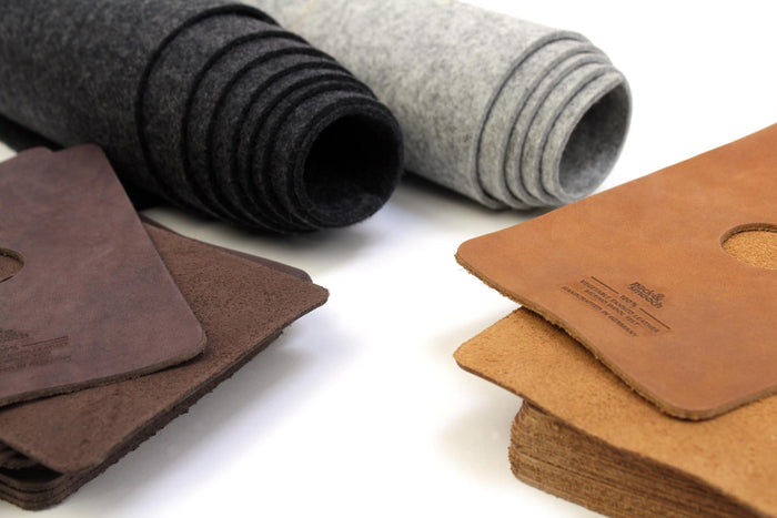 Merino wool felt on the roll and leather parts with the blind embossed mark